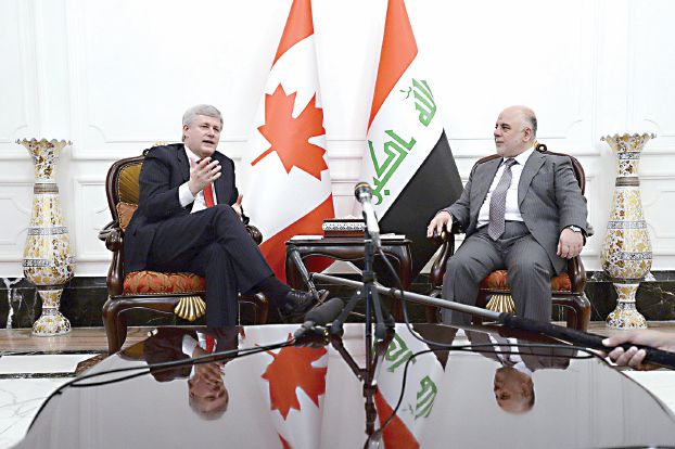 昨日バグダードでカナダ首相と会談するアバーディー首相（Reuters）