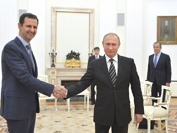 アサド・プーチン両大統領、昨日のクレムリンで（Reuters）